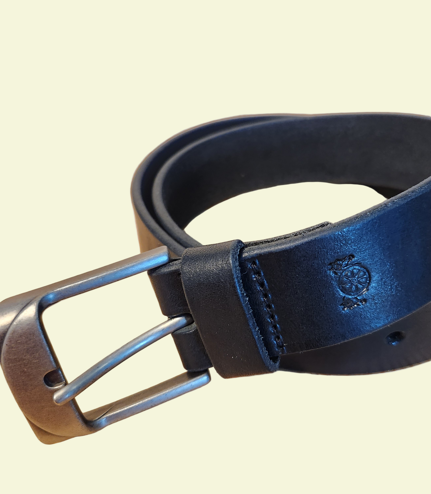 Black leather belt with silver buckle