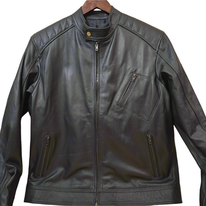 Black leather jacket on a hanger against a white background