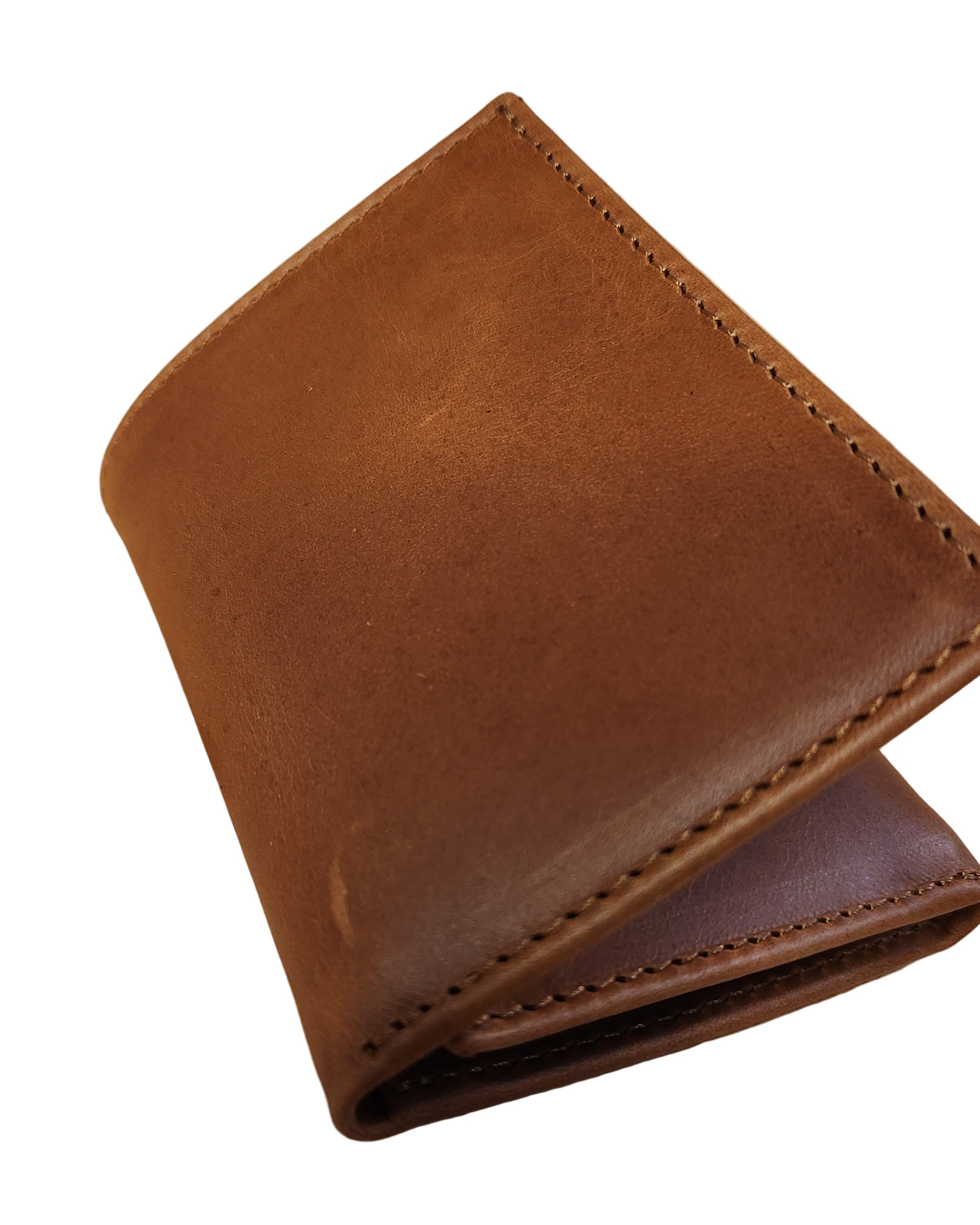 Brown leather wallet on a wooden surface