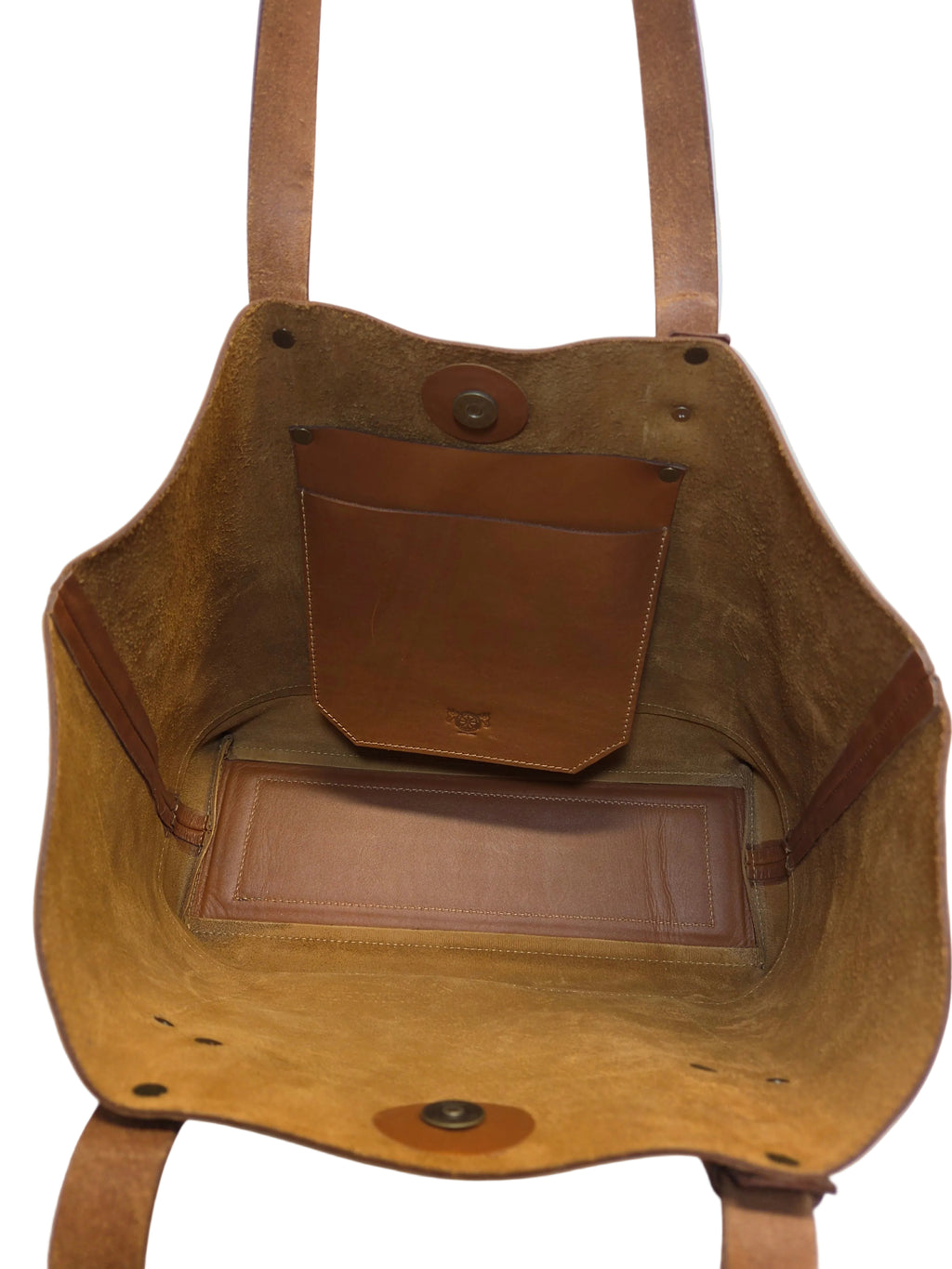 Brown leather bag with a strap on a white background