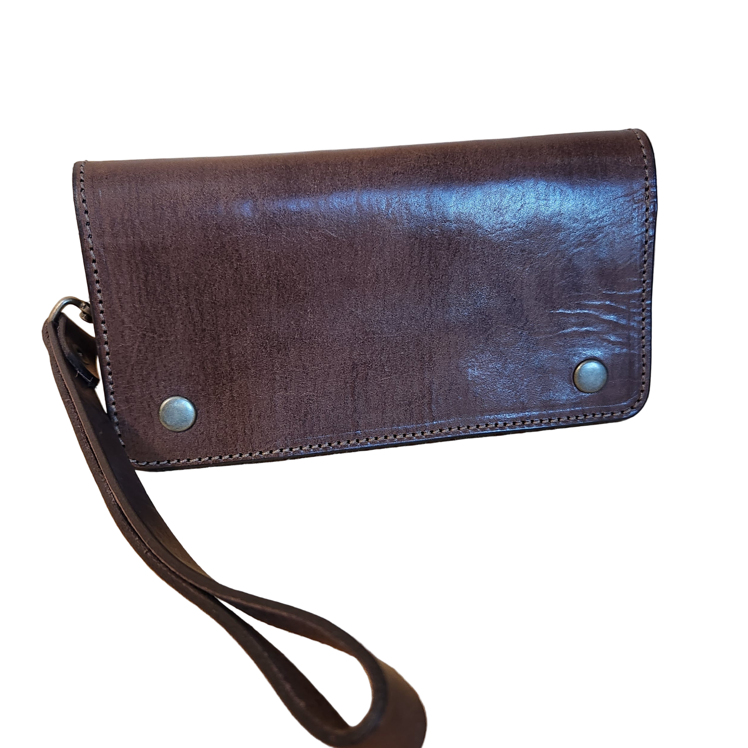 Brown leather wallet with a strap on a wooden surface