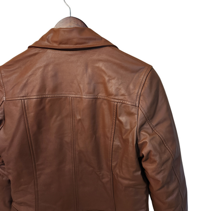 Brown leather jacket on a hanger against a white background