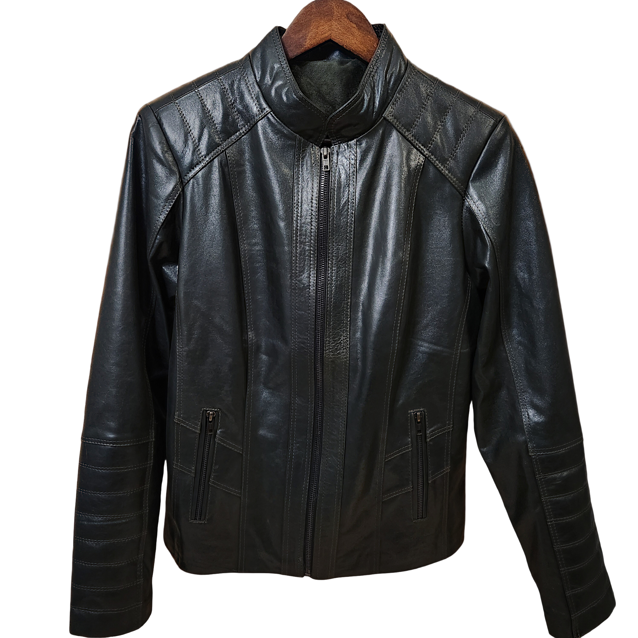 Olive color leather jacket on a wooden hanger against a rustic wooden background