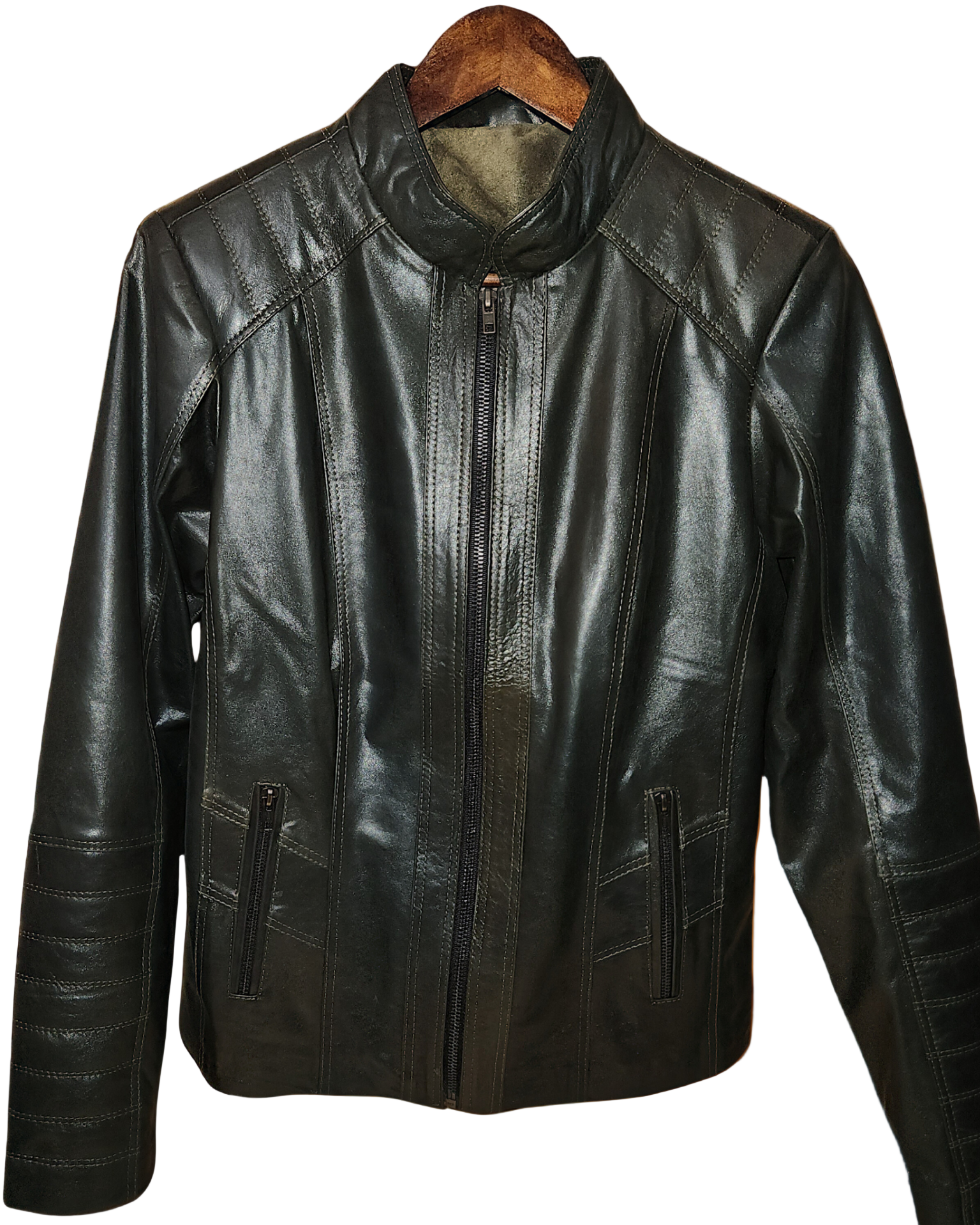 Emerald leather jacket on a wooden hanger against a blurred indoor background
