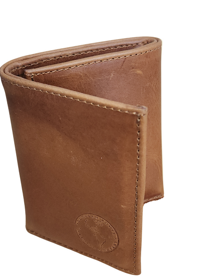 Brown leather wallet on a beige background