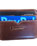 Brown leather wallet with cards on a wooden surface